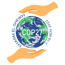 two hands encompasing the Earth with COP 27 incased within the globe