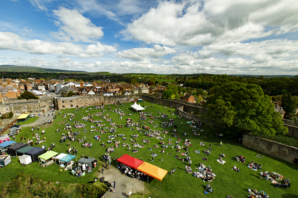 Ariel shot of picnic goers in Ludlow Castle