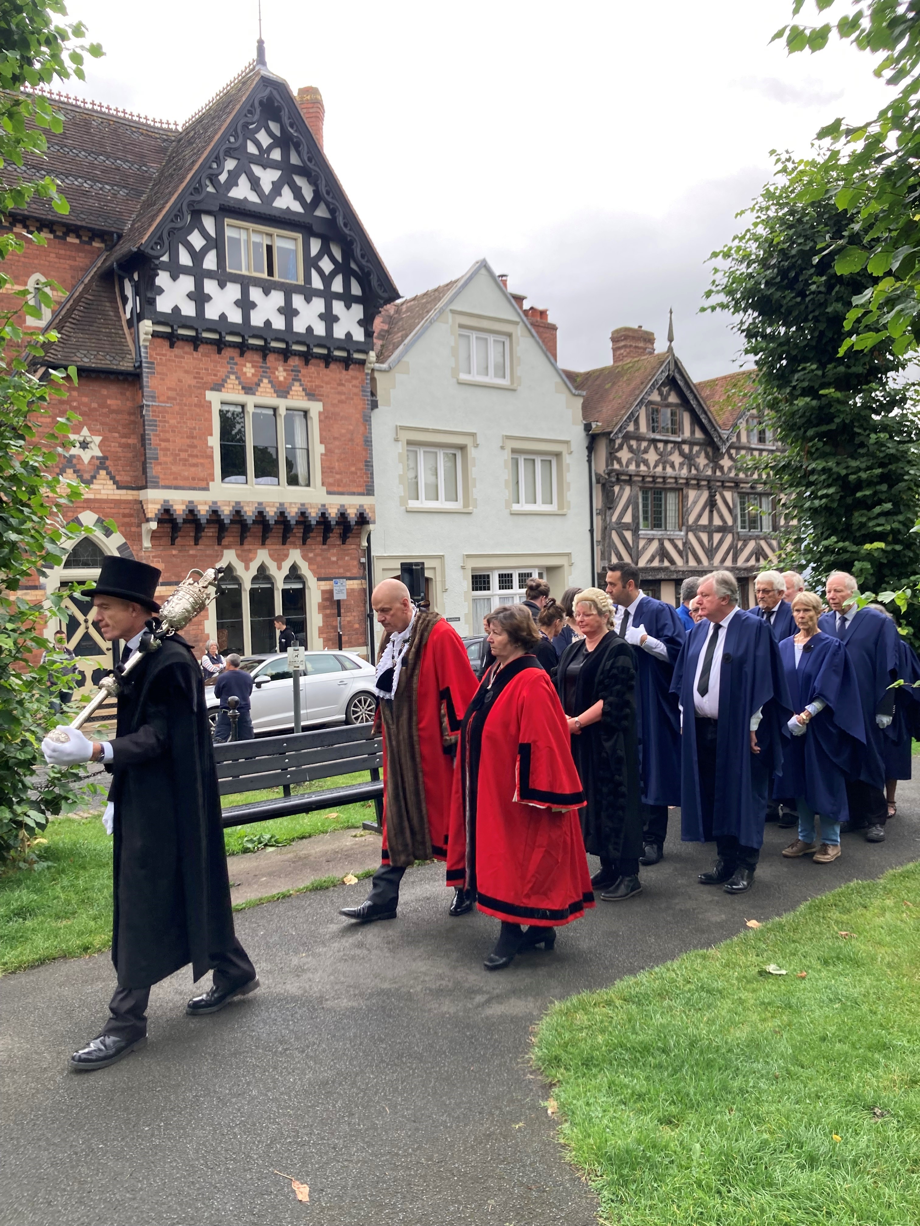 the mace bearer leads the procession of Councilors, the Mayor, the town clerk and other members of staff
